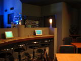 A bar with a homey atmosphere where a wide range of customers gather.
